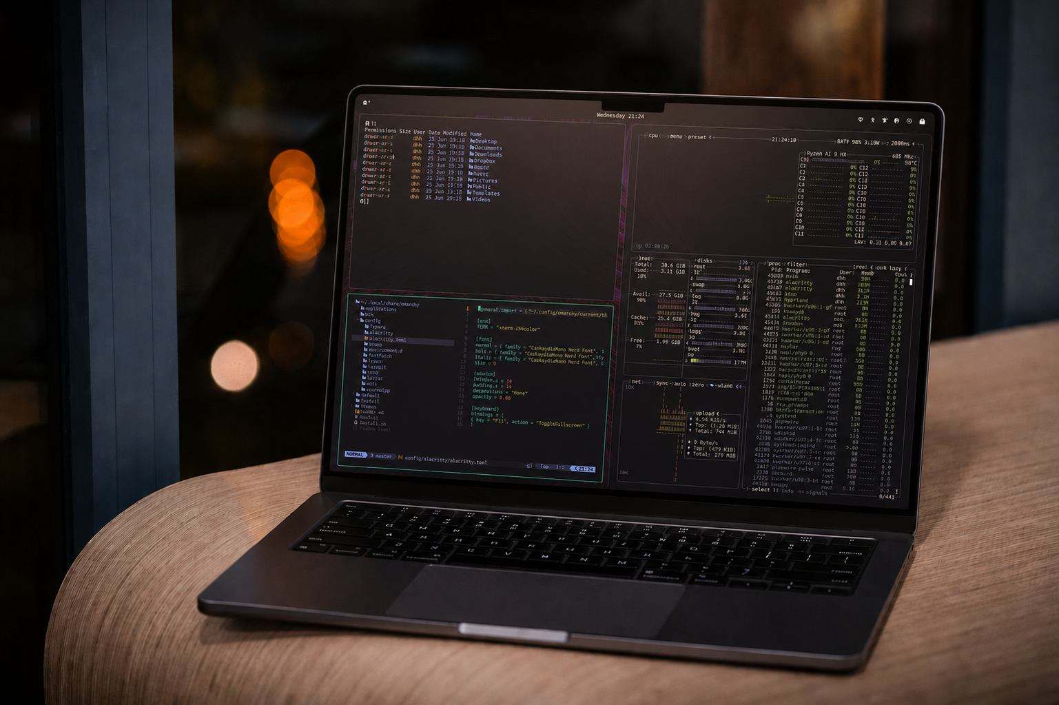 An image of a Macbook Neo with Omarchy installed on it